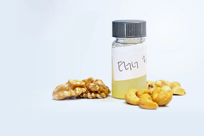 Labeled bottle of allergen extract with walnuts and cashews